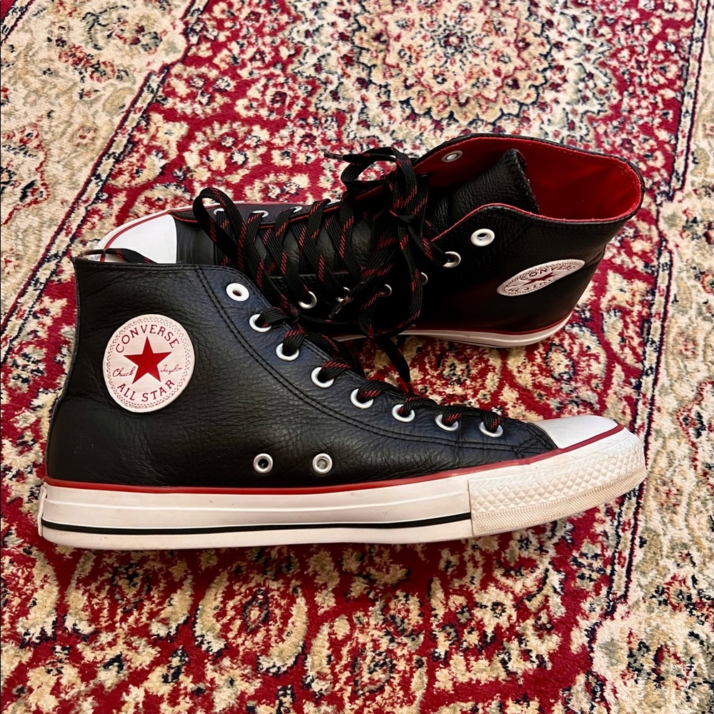 Black leather high top Converse with red detail